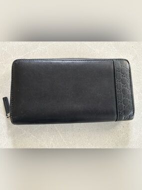 Gucci Black Leather Zip Wallet with GG Embossed Trim